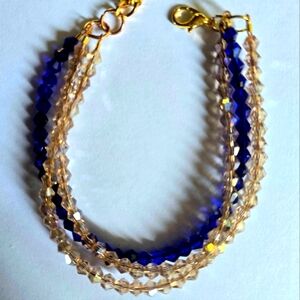 SWAROVSKI  BEAD  3 STRAND CHAMPAGNE/OCEAN BLUE 1 SIZE ARTESAN ORIGINAL BRACELET